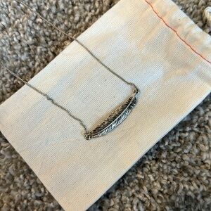 Silver short necklace with leaf charm